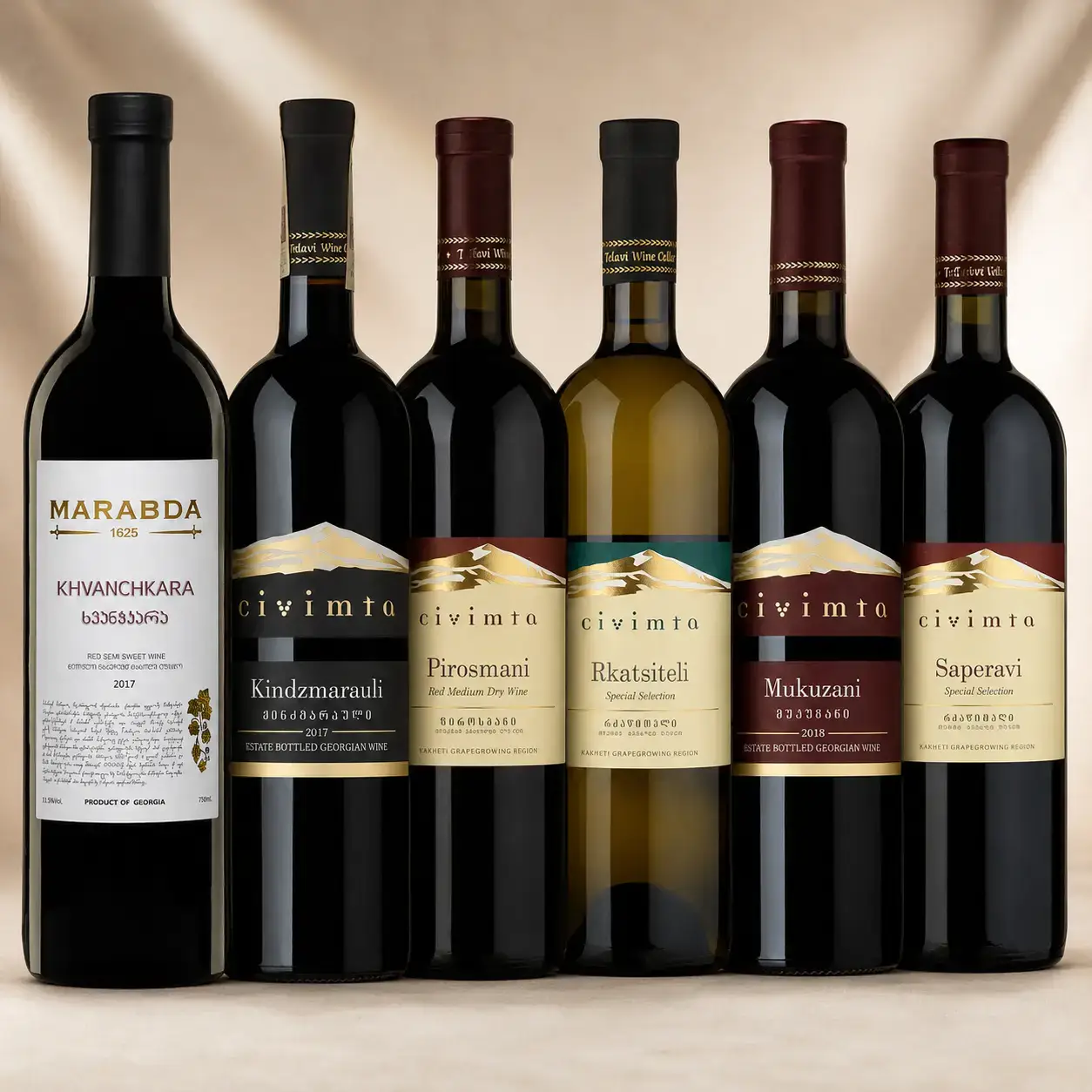 Six bottles in the Georgian Favourites Mixed Case arranged on a premium neutral background